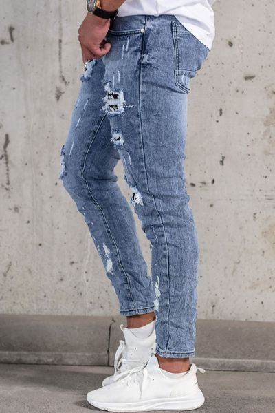 vaqueros streetwear azules de hombre con desgaste, lavado a la piedra y broderie decorativo