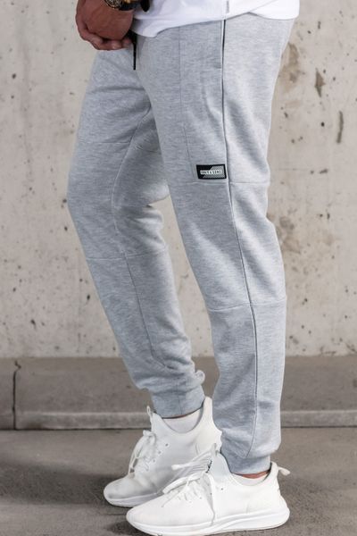 pantalones de chándal gris de los hombres con bolsillos con cremallera