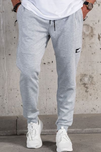 pantalones de chándal gris de los hombres con bolsillos con cremallera
