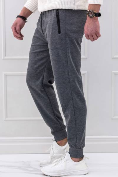 pantalones de chándal gris de los hombres con bolsillos con cremallera