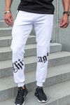 Pantalones de chándal blancos con superficie resbaladiza y estampado