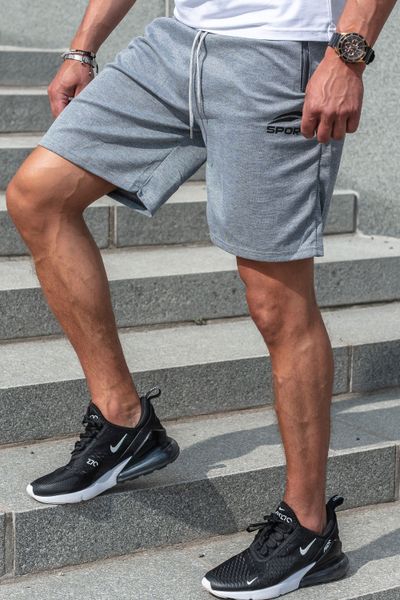Pantalones cortos tipo college grises con bolsillos con cremallera