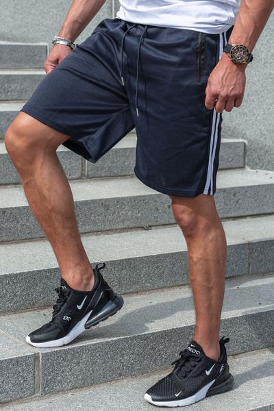 Pantalones cortos azul oscuro con rayas laterales y bolsillos con cremallera